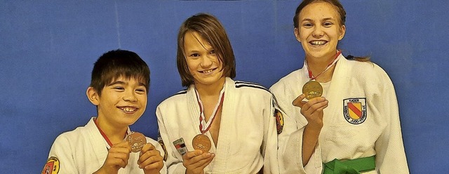 Freuen sich ber ihre Medaillen: Nico ...links), Quentin Bittl und Belana Bittl  | Foto: Jessica Weber