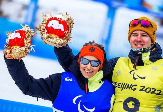 Linn Kazmaier vom Freiburger Sportinte...orian Baumann von der Skizunft Uhingen  | Foto: Jens Bttner (dpa)