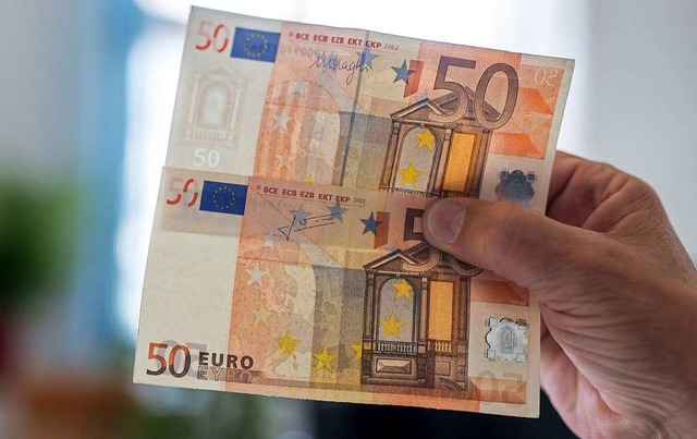 Ein echter (oben) und ein geflschter 50-Euro-Schein  | Foto: Matthias Balk