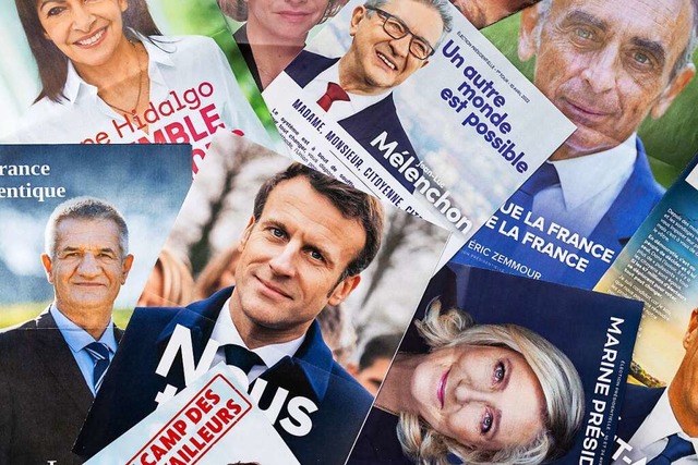 Wie schon 2017 gehen Emmanuel Macron und Marine Le Pen in die Stichwahl.  | Foto: Daniel Karmann (dpa)