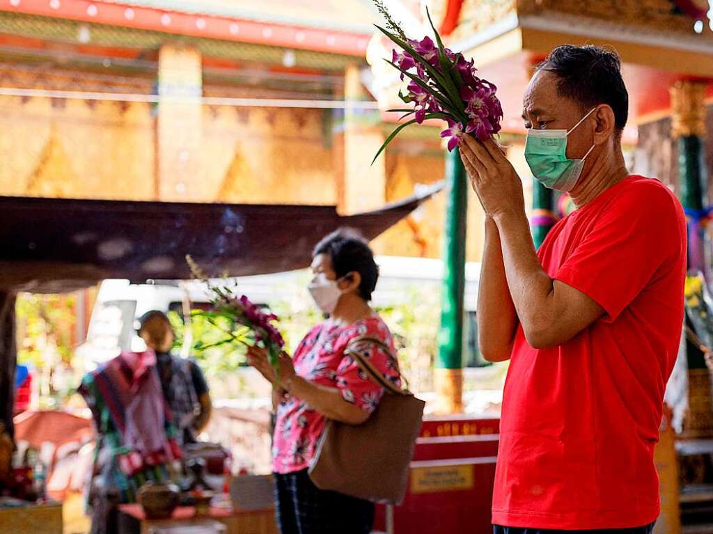 Wasser und buddhistische Rituale stehen im Mittelpunkt des Neujahrsfests Songkran in Thailand.