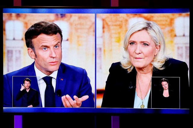 TV-Debatte zwischen Emmanuel Macron (l...en Partei Rassemblement National (RN).  | Foto: Ludovic Marin (dpa)