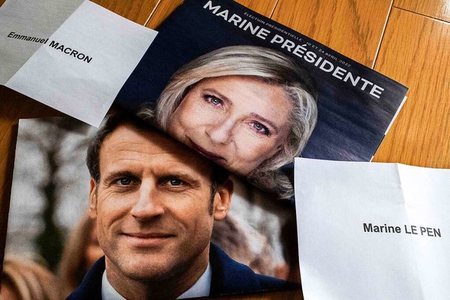 Wer gewinnt die Prsidentschaftswahl i...h? Emmanuel Macron oder Marine Le Pen?  | Foto: CHARLY TRIBALLEAU (AFP)