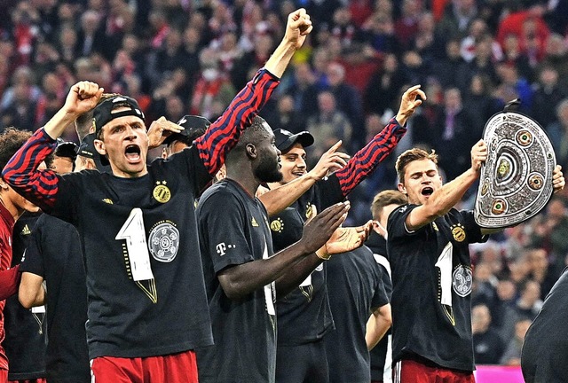 Haben schon bung beim Meister-Jubel: ...r des Rekordmeisters FC Bayern Mnchen  | Foto: CHRISTOF STACHE (AFP)