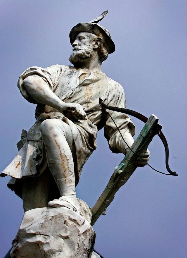 Eine Skulptur von Wilhelm Tell mit seiner Armbrust in Lausanne in der Schweiz.  | Foto: FABRICE COFFRINI