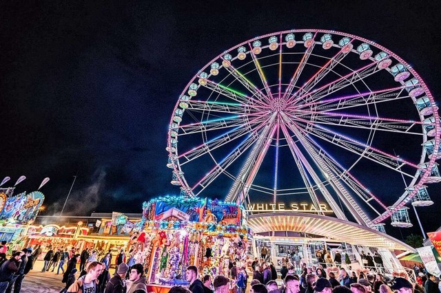 Riesenrad, Zuckerwatte und viele bunte...da: die Freiburger Frhjahrsmess&#39;.  | Foto: feyka&herr