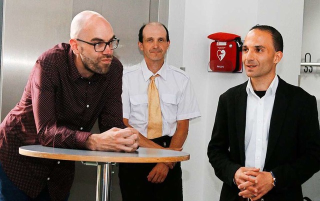 Die Kandidaten Oliver Melzer (sieben S...ng im Rathaus Schwanau am Sonntagabend  | Foto: Heidi Fel