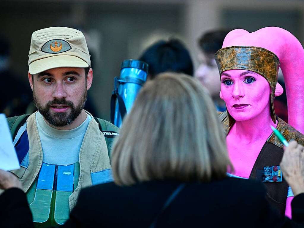 Star-Wars-Fans aus der ganzen Welt tummeln sich derzeit auf der Messe in Anaheim, Kalifornien, und gehen auf im Star-Wars-Universum.