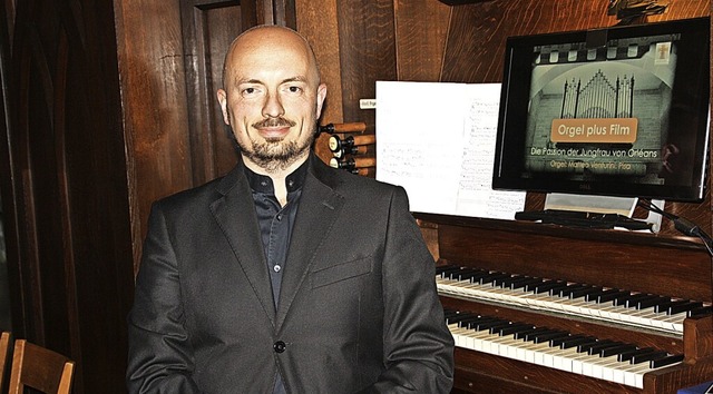 Organist Matteo Venturini spielte zum Stummfilm  | Foto: Christiane Franz