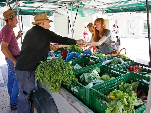 Frische und regionale Lebensmittel loc...nden auf den Wochenmarkt in Neustadt.   | Foto: Eva Korinth