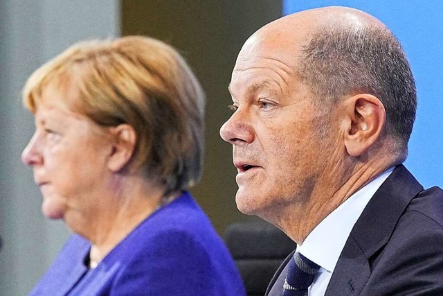 Angela Merkel (CDU) und Olaf Scholz (SPD)  | Foto: Michael Kappeler (dpa)