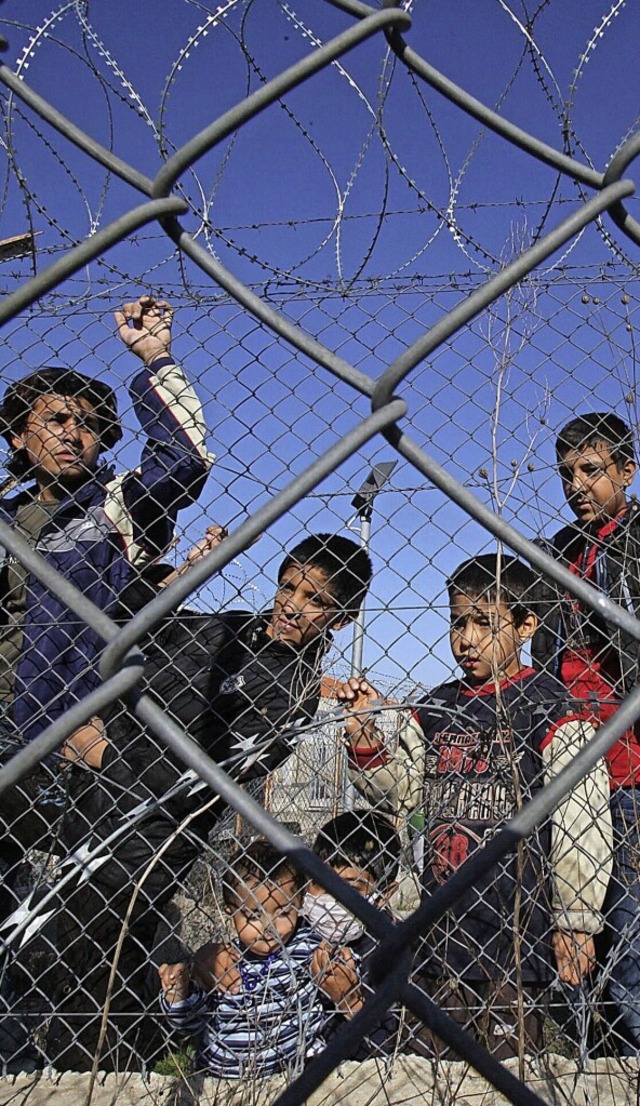 Flchtlinge sollen von griechischen Be...n, andere Flchtlinge zurckzuweisen.   | Foto: Nikos Arvanitidis