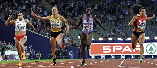 Knapper Sieg im 100-Meter-Finale: Gina...l Neita (M./Grobritannien)  ins Ziel.  | Foto: Sven Hoppe (dpa)