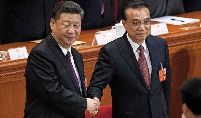 Spitzenpolitiker im Dissens: Staatsche...inping (links) und Premier Li Keqiang   | Foto: NICOLAS ASFOURI
