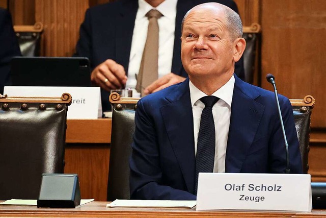 &#8222;Ich habe keinen Einfluss genomm... Bundeskanzler Olaf Scholz in Hamburg.  | Foto: Christian Charisius (dpa)