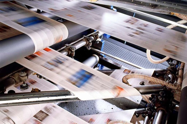 Machen Tempo: frisch bedruckte Papierbahnen fr die BZ  | Foto: KBA
