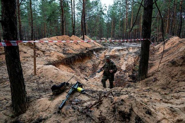 Grber und Folterrume in befreiten ukrainischen Gebieten entdeckt