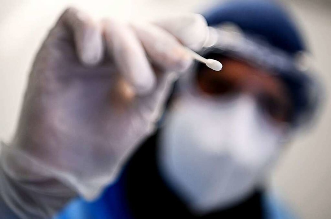 Nur positive PCR-Tests gehen in die Co... in Sdbaden tagelang versumt worden.  | Foto: Britta Pedersen (dpa)