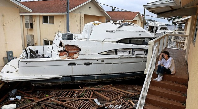 Hurrikan Ian schleuderte in Fort Myers Boote in ein Wohngebiet.  | Foto: JOE RAEDLE (AFP)