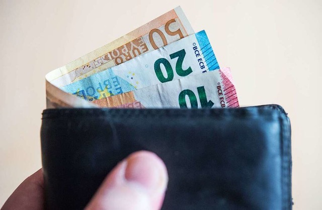 Ein Geldbeutel (Symbolbild)  | Foto: Lino Mirgeler (dpa)