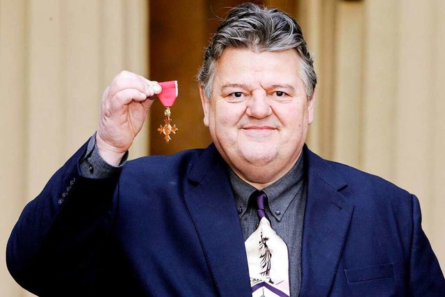 2006 erhielt der Schotte Robbie Coltra...Queen den Order of The British Empire.  | Foto: Andrew Parsons (dpa)