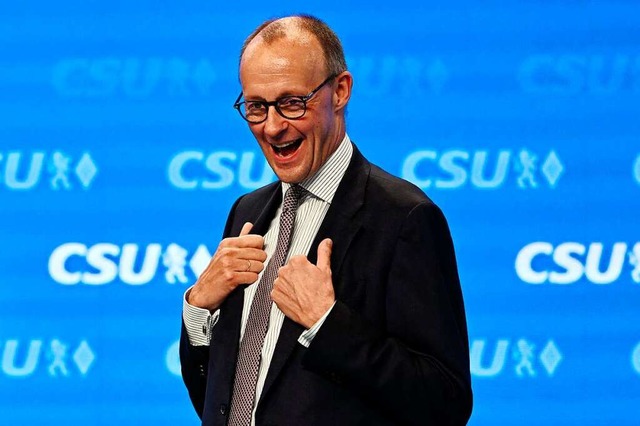 Umjubelt beim CSU-Parteitag: CDU-Vorsitzender Friedrich Merz  | Foto: CHRISTOF STACHE (AFP)
