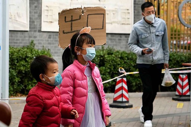 Manche Schulen in China wurden bereits wieder geschlossen (Symbolfoto).  | Foto: Ng Han Guan (dpa)