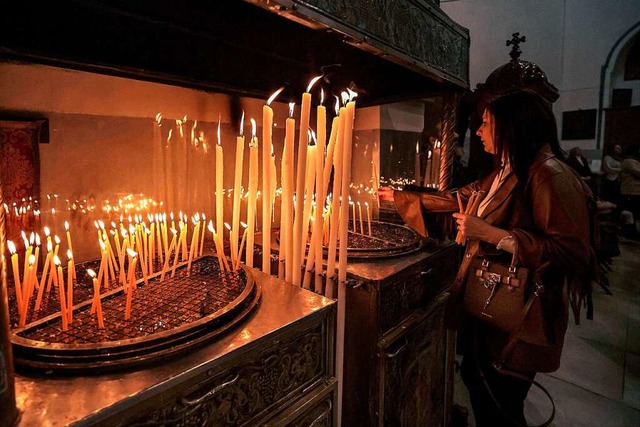Kerzen in der Geburtskirche in Bethlehem.  | Foto: HAZEM BADER (AFP)