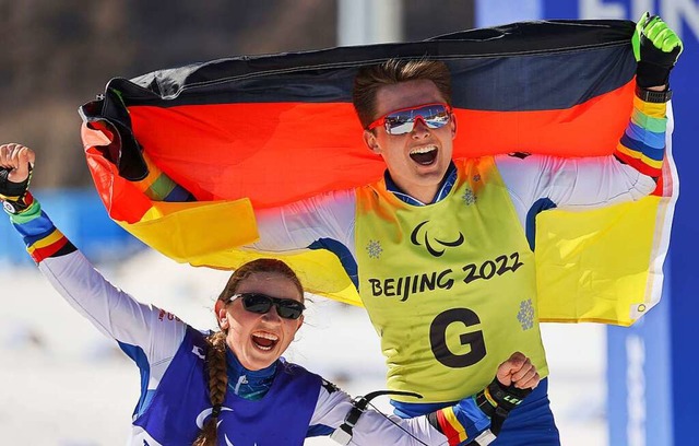So sehen Sieger aus: Leonie Walter aus...ieleinlauf bei den Olympischen Spielen  | Foto: Jens Bttner (dpa)