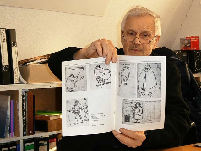 Hans-Jrg Jenne mit dem von Fritz Boehle gezeichneten Comicbuch.  | Foto: Sylvia-Karina Jahn
