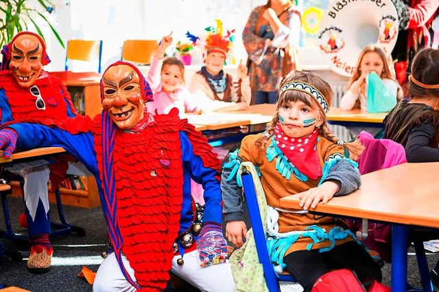 Schlerinnen und Schler der Grundschu...tunde Wissenswertes ber die Fasnacht.  | Foto: Wolfgang Scheu