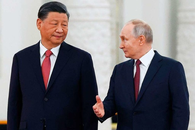 Xi Jinping und Wladimir Putin beim Treffen im Kreml  | Foto: SERGEI KARPUKHIN (AFP)