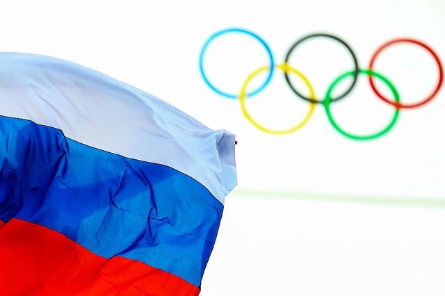 Russische Einzelsportler drfen voraus...he Fahne wird aber nicht wehen drfen.  | Foto: Hannibal Hanschke (dpa)