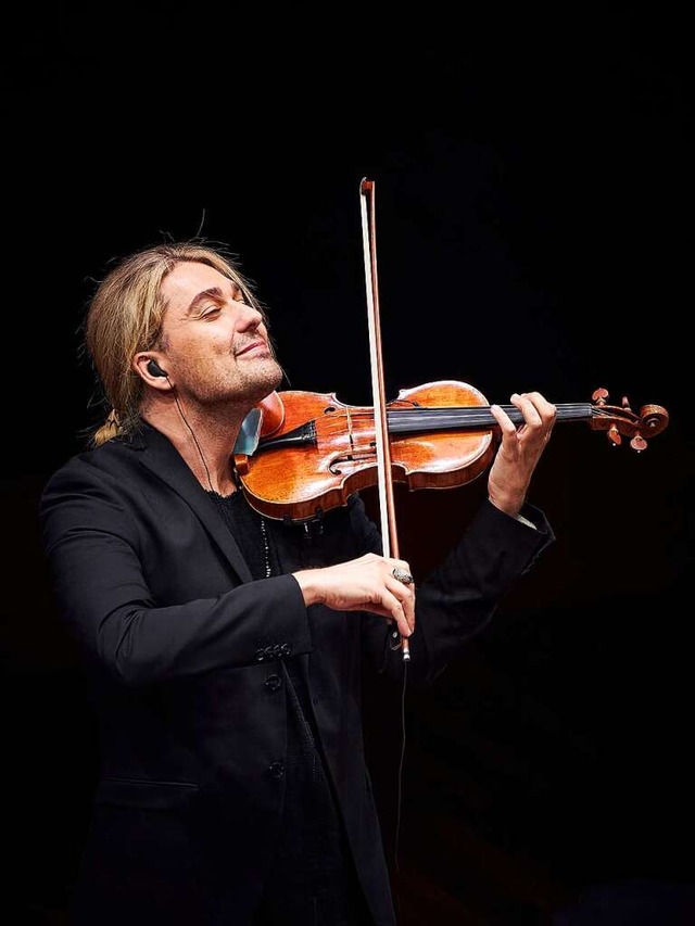 &#8222;Um Geige spielen zu knnen, mus...eiten&#8220;: David Garrett beim Spiel  | Foto: Benno Hunziker
