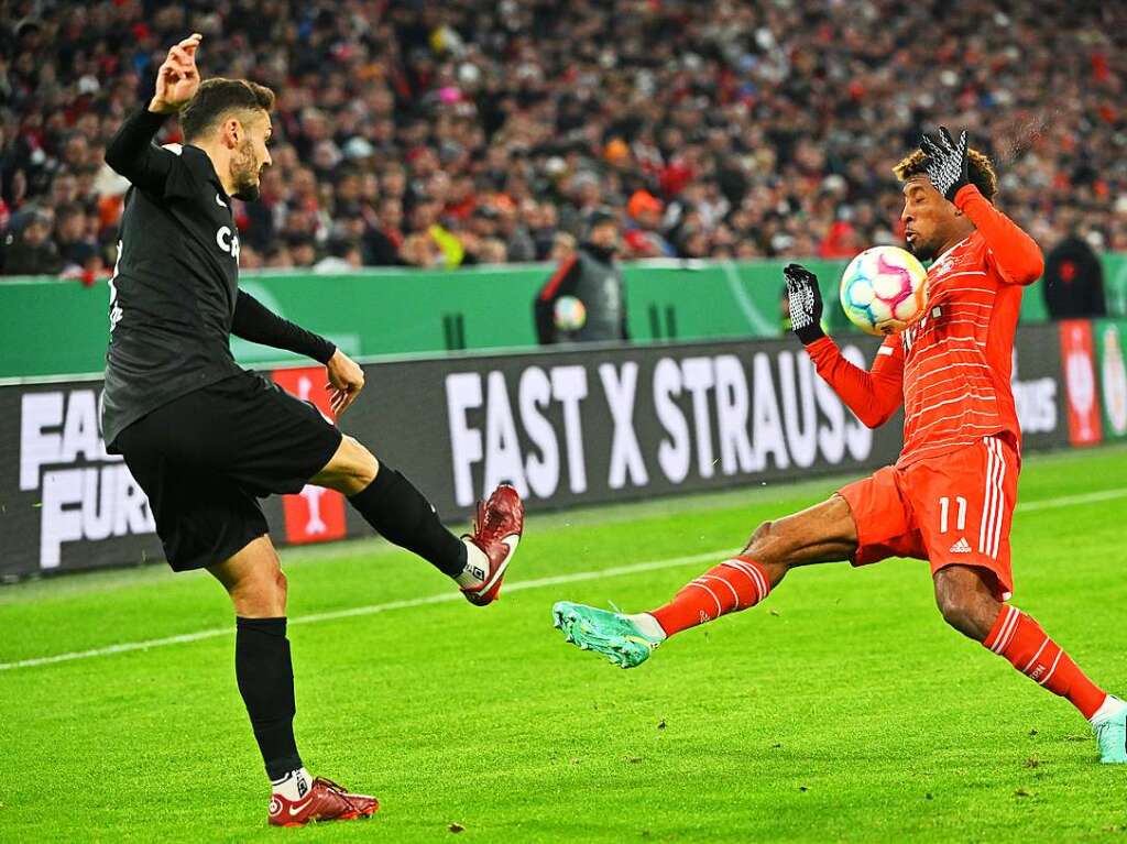 Manuel Gulde (L) vs. Kingsley Coman