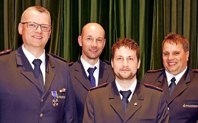 Geehrte (von links):  Martin Freudig, ...rtretende  Kommandant Martin Burgert.   | Foto: Eva Korinth