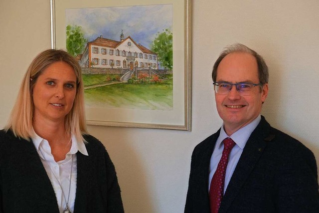 Melanie Vollmer und Christian Renkert vor einem Brgeln-Bild  | Foto: Martin Pfefferle