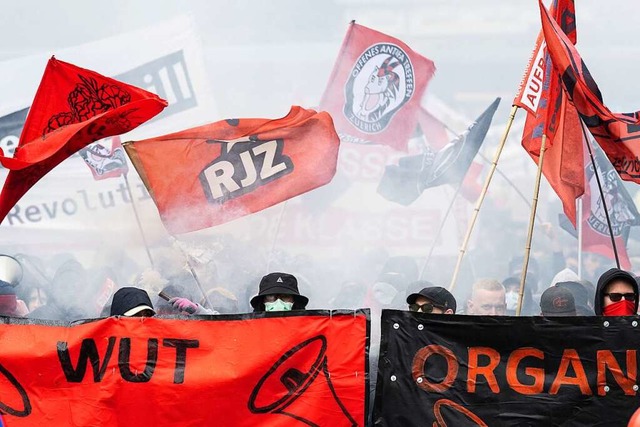 Vermummte Demonstranten am 1. Mai in Basel  | Foto: Ennio Leanza (dpa)