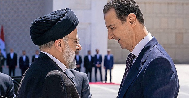 Ebrahim Raisi (links) mit Syriens Machthaber Baschar al-Assad  | Foto: - (AFP)