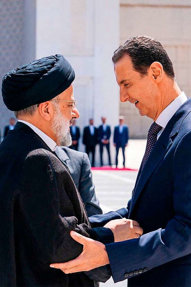 Syriens Staatschef Baschar al-Assad em...Präsidenten Ebrahim Raisi in Damaskus. | Foto: - (AFP) Syriens Staatschef Baschar al-Assad em...Präsidenten Ebrahim Raisi in Damaskus. | Foto: - (AFP)