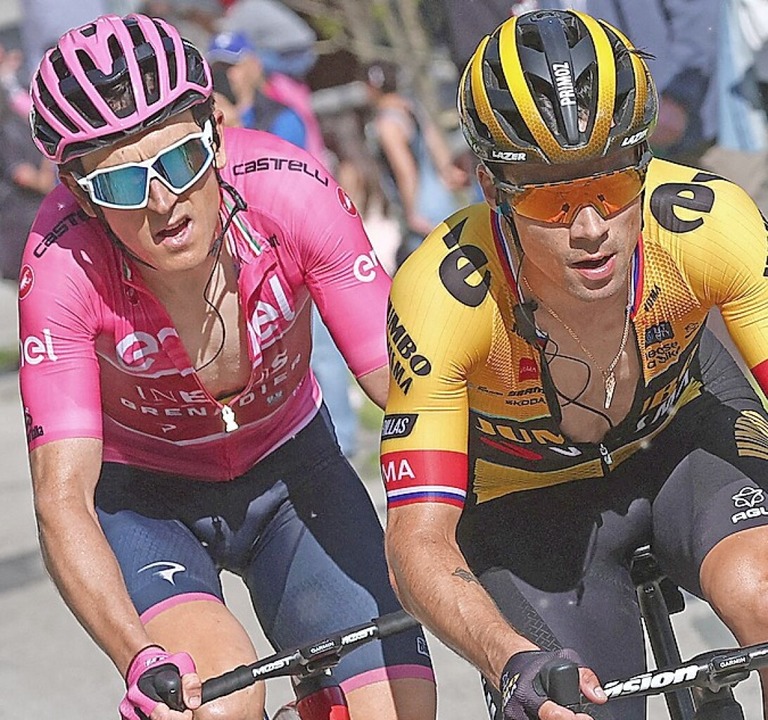 Der Gesamt-Fhrende Geraint Thomas (links) und  Primoz Roglic  | Foto: LUCA BETTINI (AFP)