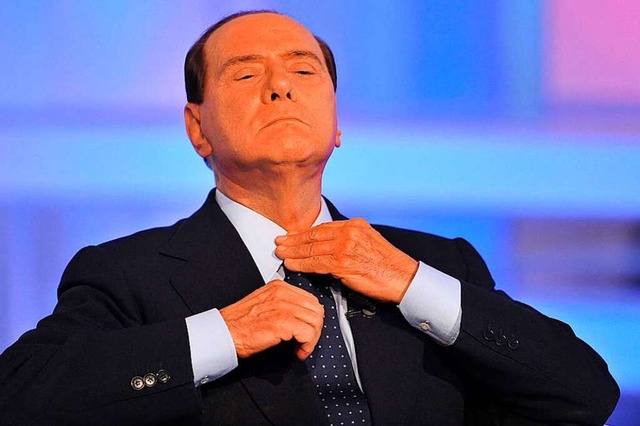 Hier war er ganz der Staatsmann: Silvi...l italienischer Ministerprsident war.  | Foto: ANDREAS SOLARO, - (AFP)