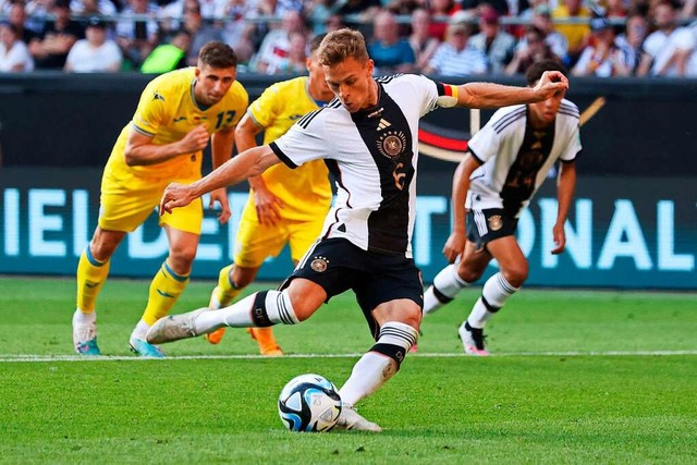 Manchmal bereifrig, schnell sauer, ab...l fr das Nationalteam: Joshua Kimmich  | Foto: FOCKE STRANGMANN (AFP)