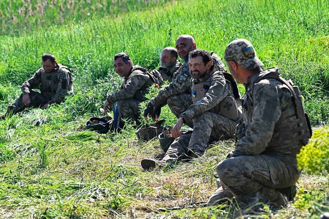 Der Krieg hat sich zu einem brutalen G...unweit der Front in der Region Donezk.  | Foto: GENYA SAVILOV (AFP)