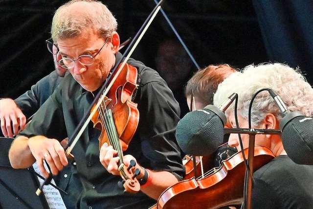Musiker des Freiburger Barockorchester...platz-Konzert im Juni 2023 in Freiburg  | Foto: Michael Bamberger
