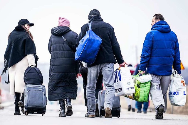 Viele Menschen, die auf der Flucht waren, haben Traumatisches erlebt.  | Foto: Michael Kappeler (dpa)