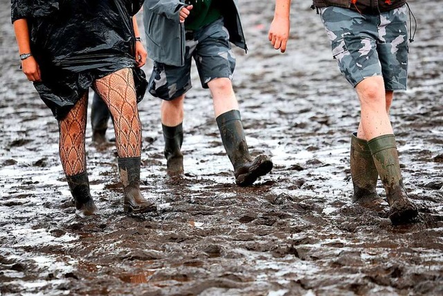 Tagelanger Regen machte auch dem Geln...r Besucher nahmen es mit Gelassenheit.  | Foto: Christian Charisius