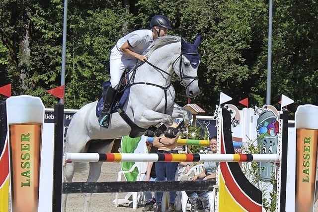 Reiter trotzen dem Wetter