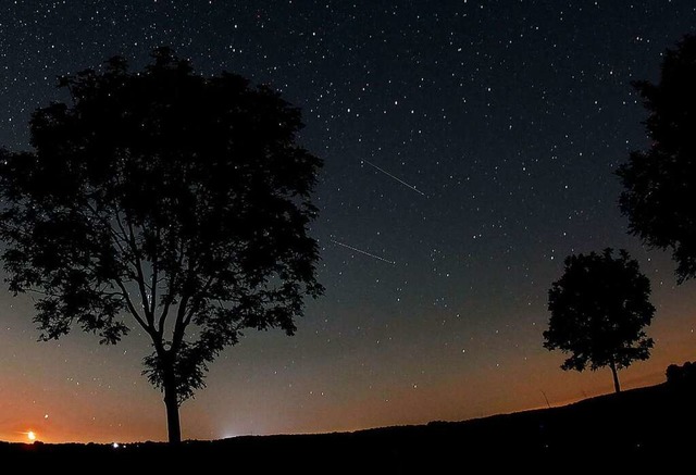 Die Sternschnuppen der Perseiden sind ein Fest fr Sternenfreunde.  | Foto: Oliver Berg (dpa)