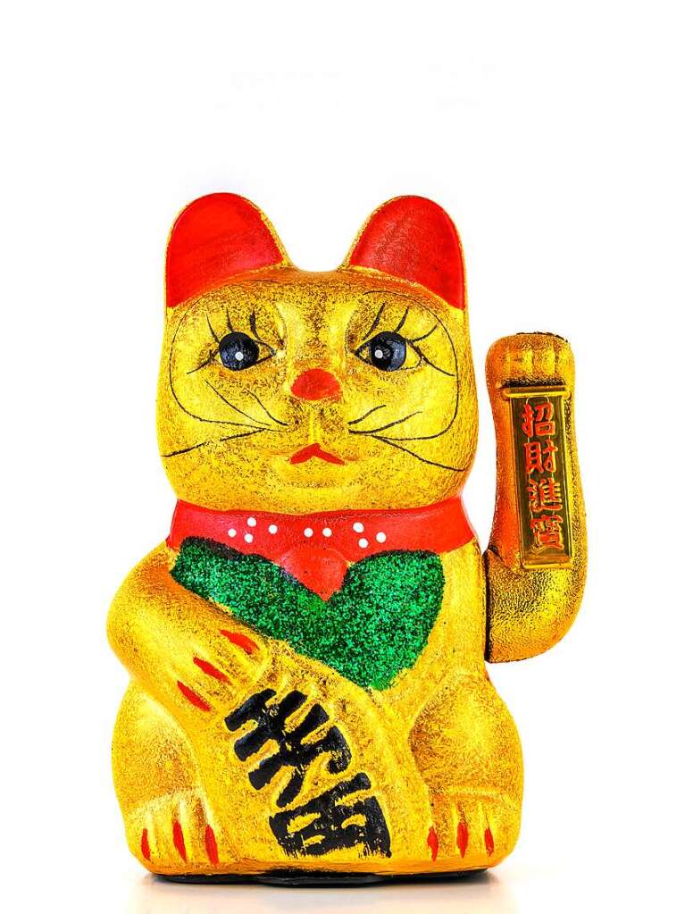 Die japanische Katze Maneki-Neko – auch bekannt als „Winkekatze“ – ist eine traditionelle Gttin, die neben Glck genauso Reichtum herbeirufen soll